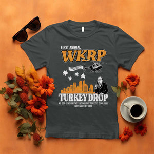 WKRP Turkey Drop with Les Nessman T Shirt Retro Thanksgiving Humor for Classic TV Fans TS02 Dark Heather Print Your Wear