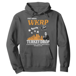 WKRP Turkey Drop with Les Nessman Hoodie Retro Thanksgiving Humor for Classic TV Fans TS02 Dark Heather Print Your Wear