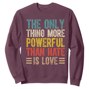 The Only Thing More Powerful Than Hate Is Love Sweatshirt Bold Retro Typography Bunny Inspirational Quote TS02 Maroon Print Your Wear
