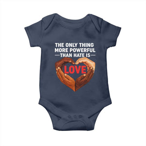 The Only Thing More Powerful Than Hate Is Love Baby Onesie Heart in Hands Unity Bunny Inspirational Quote TS02 Navy Print Your Wear