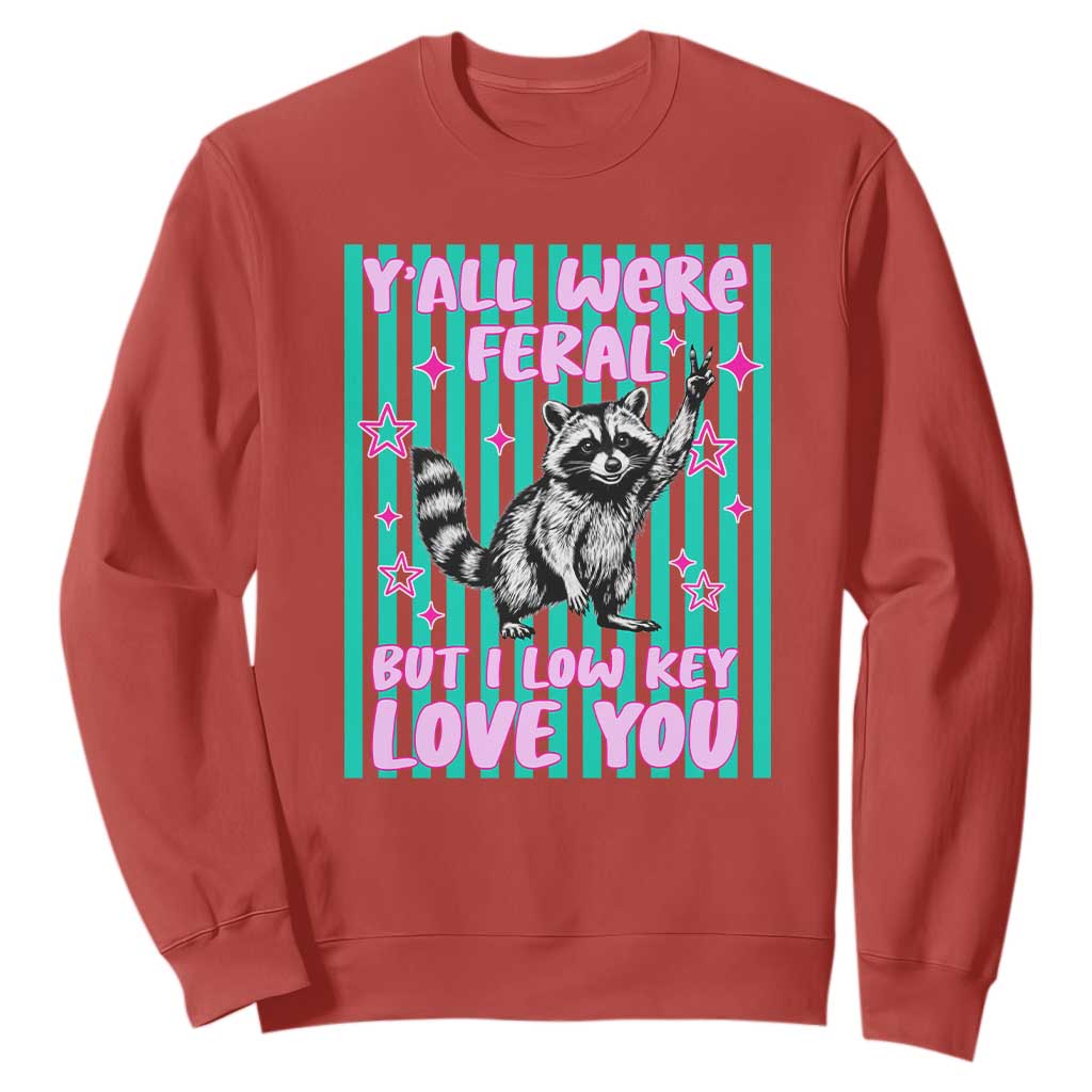 Y'all Were Feral But I Low Key Love You Pink Stripes Raccoon Sweatshirt Funny Teacher End of School Year TS02 Red Print Your Wear