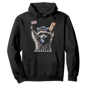 Funny America Raccoon Happy 4th of July Hoodie Holding Hotdog and US Flag Patriotic Graphic