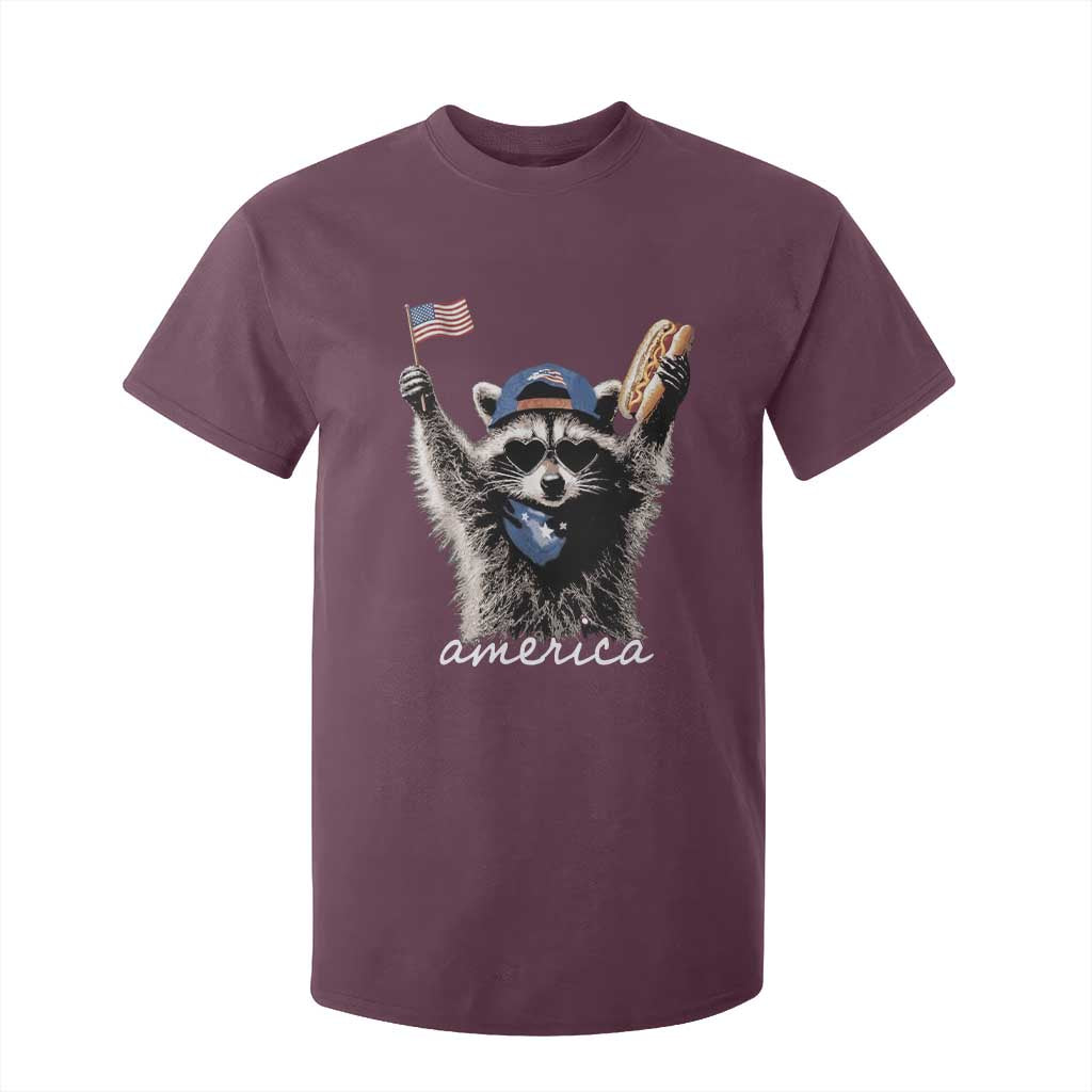 Funny America Raccoon Happy 4th of July T Shirt For Kid Holding Hotdog and US Flag Patriotic Graphic
