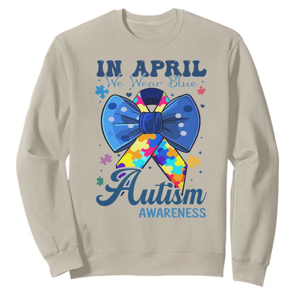 Autism Awareness Sweatshirt In April We Wear Blue Puzzle Ribbon Coquette Bow TS02 Sand Print Your Wear