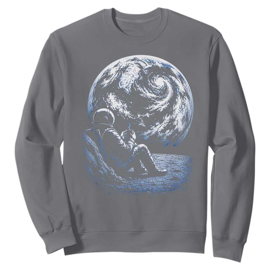 Astronaut Drinking Coffee On The Moon Graphic Sweatshirt Vintage Sci Fi Earth Horizon Space Explorer TS02 Charcoal Print Your Wear