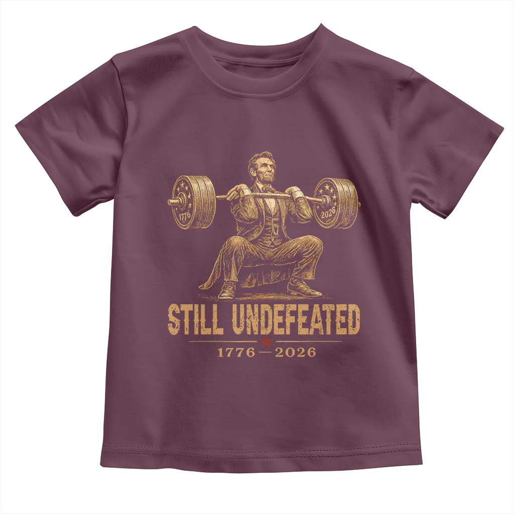 Funny Abraham Lincoln Squatting Barbell Semiquincentennial Toddler T Shirt Still Undefeated 1776 to 2026 Muscular President Gym Bodybuilder