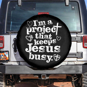 I am a Project That Keeps Jesus Busy Funny Christian Typography Spare Tire Cover Faith Humor Inspirational Gift TS02 No hole Black Print Your Wear