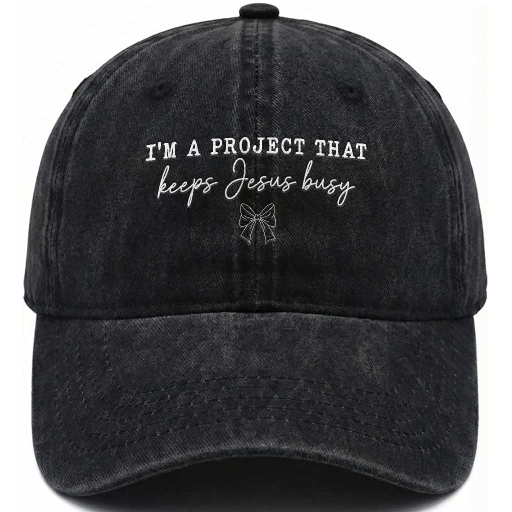 I am a Project That Keeps Jesus Busy Coquette Bow Washed Cotton Baseball Cap Christian Faith Humor