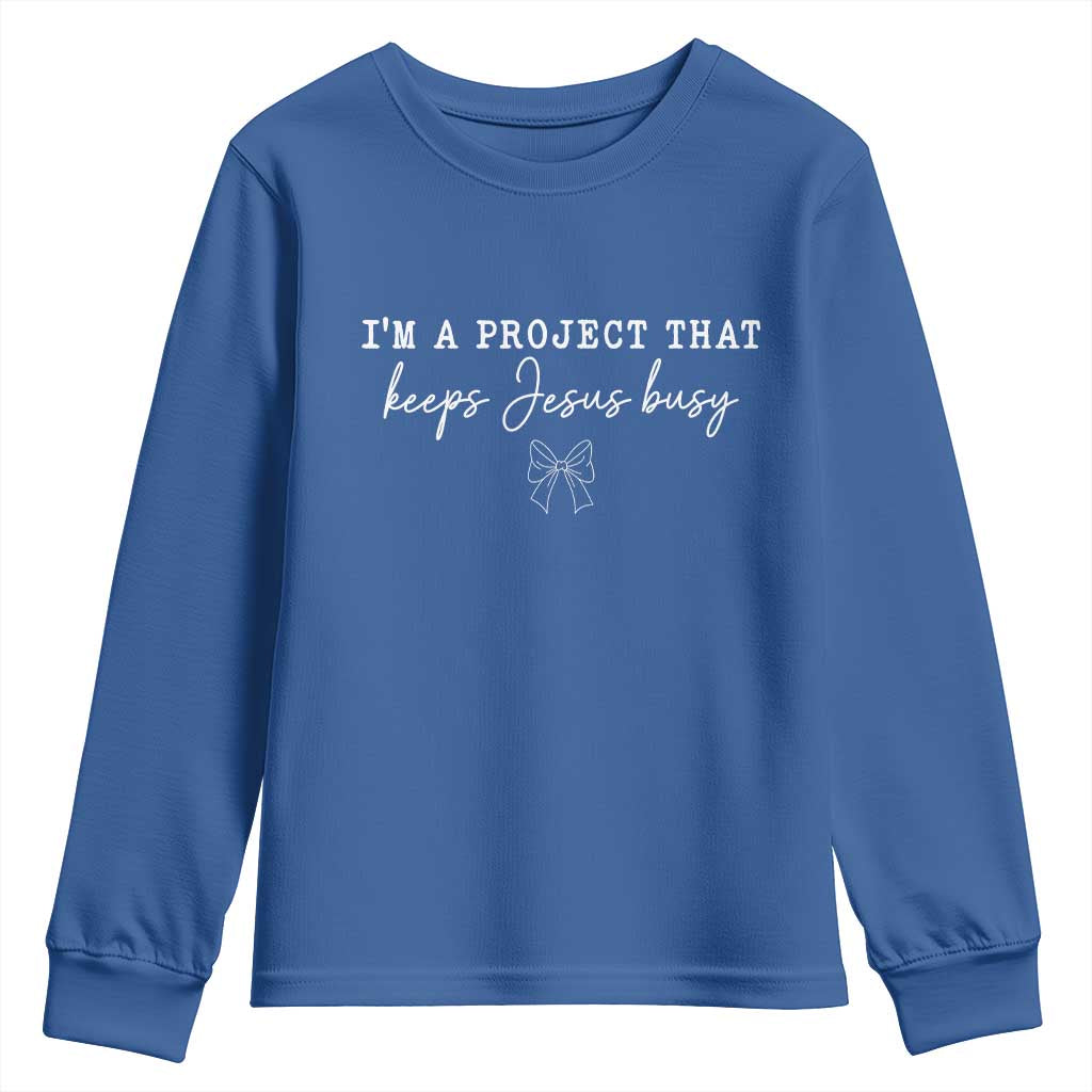 I am a Project That Keeps Jesus Busy Coquette Bow Youth Sweatshirt Christian Faith Humor TS02 Royal Blue Print Your Wear