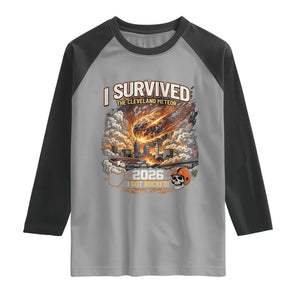 I Survived The Cleveland Meteor 2026 Raglan Shirt Funny Ohio Apocalypse Meme Vintage Football Fan Humor TS02 Sport Gray Black Print Your Wear