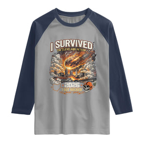 I Survived The Cleveland Meteor 2026 Raglan Shirt Funny Ohio Apocalypse Meme Vintage Football Fan Humor TS02 Sport Gray Navy Print Your Wear