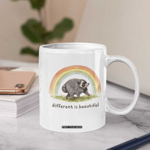 Cute Viral Raccoon Positive Quote Coffee Mug Different Is Beautiful Pastel Rainbow Graphic