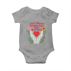 I Hear Migrant Children Also Have Heartbeats Baby Onesie Groovy Retro Floral Hands Heart Social Justice