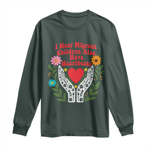 I Hear Migrant Children Also Have Heartbeats Long Sleeve Shirt Groovy Retro Floral Hands Heart Social Justice