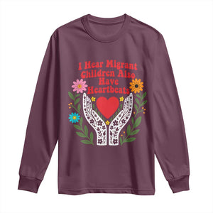 I Hear Migrant Children Also Have Heartbeats Long Sleeve Shirt Groovy Retro Floral Hands Heart Social Justice