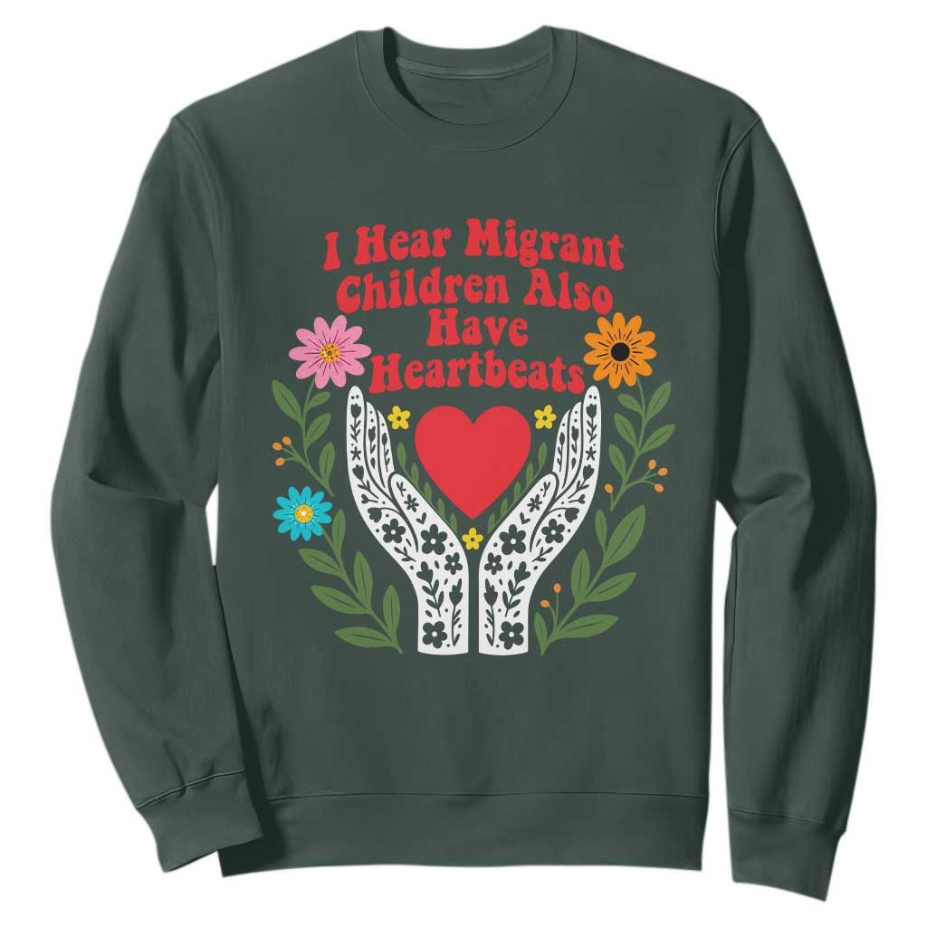 I Hear Migrant Children Also Have Heartbeats Sweatshirt Groovy Retro Floral Hands Heart Social Justice