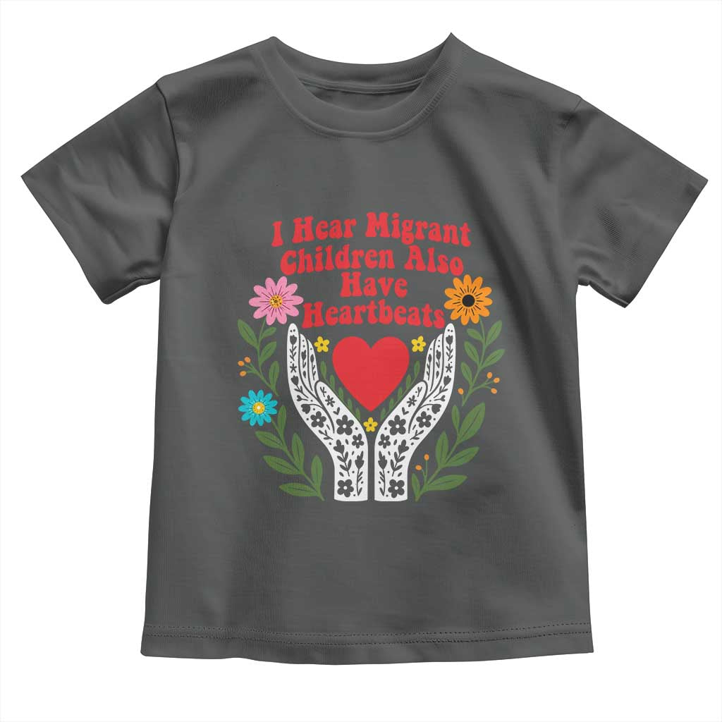 I Hear Migrant Children Also Have Heartbeats Toddler T Shirt Groovy Retro Floral Hands Heart Social Justice