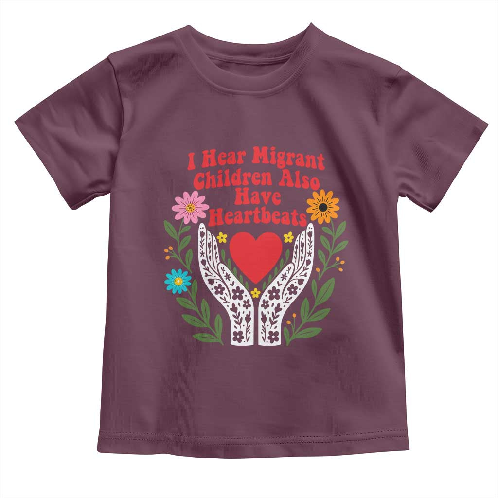 I Hear Migrant Children Also Have Heartbeats Toddler T Shirt Groovy Retro Floral Hands Heart Social Justice