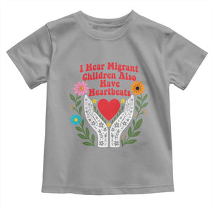I Hear Migrant Children Also Have Heartbeats Toddler T Shirt Groovy Retro Floral Hands Heart Social Justice