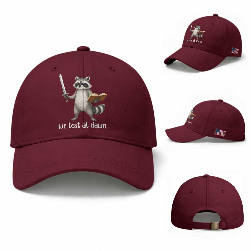 We Test At Dawn Raccoon Warrior Baseball Cap Funny Student Teacher Exam Motivation TS02 Baseball Cap Universal Fit Maroon Print Your Wear