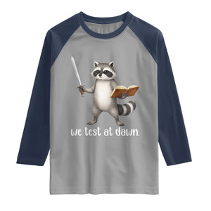 We Test At Dawn Raccoon Warrior Raglan Shirt Funny Student Teacher Exam Motivation TS02 Sport Gray Navy Print Your Wear