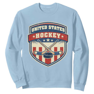 Hockey Crossed Sticks And Puck Retro USA Shield Flag Sweatshirt Red White Blue Striped Patriotic Sports Fan Pride Graphic TS02 Light Blue Print Your Wear