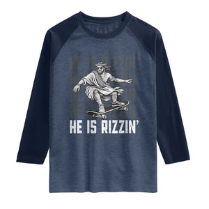 He Is Rizzin Funny Christian Easter Skateboarding Jesus Meme Raglan Shirt Faith Humor Trendy Youth Gift TS02 Heather Denim Navy Print Your Wear