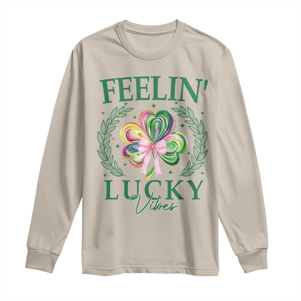 St. Patrick's Day Long Sleeve Shirt Feelin' Lucky Vibes Shamrock Coquette Bow TS09 Sand Print Your Wear