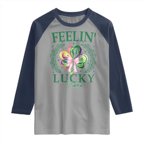 St. Patrick's Day Raglan Shirt Feelin' Lucky Vibes Shamrock Coquette Bow TS09 Sport Gray Navy Print Your Wear