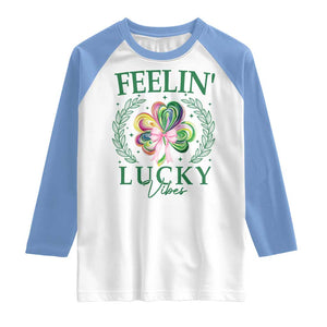 St. Patrick's Day Raglan Shirt Feelin' Lucky Vibes Shamrock Coquette Bow TS09 White Carolina Blue Print Your Wear