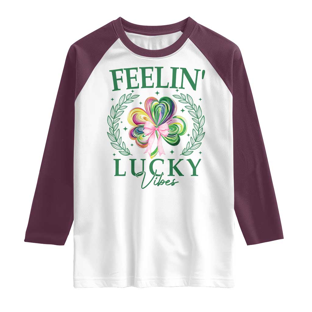 St. Patrick's Day Raglan Shirt Feelin' Lucky Vibes Shamrock Coquette Bow TS09 White Maroon Print Your Wear