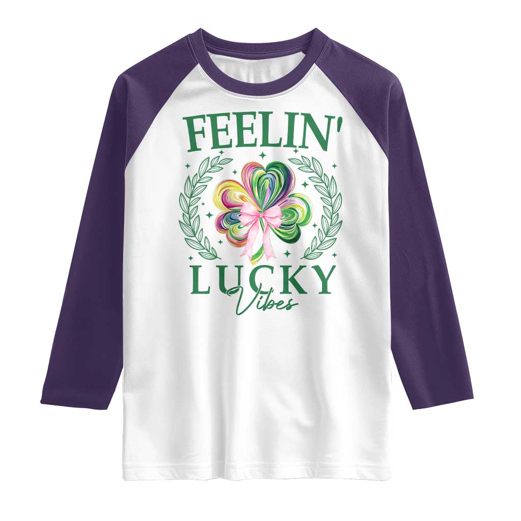 St. Patrick's Day Raglan Shirt Feelin' Lucky Vibes Shamrock Coquette Bow TS09 White Purple Print Your Wear