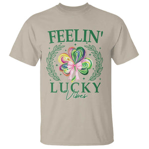 St. Patrick's Day T Shirt Feelin' Lucky Vibes Shamrock Coquette Bow TS09 Sand Print Your Wear