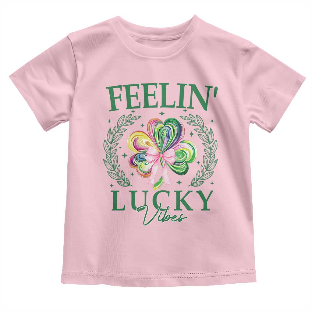 St. Patrick's Day Toddler T Shirt Feelin' Lucky Vibes Shamrock Coquette Bow TS09 Light Pink Print Your Wear