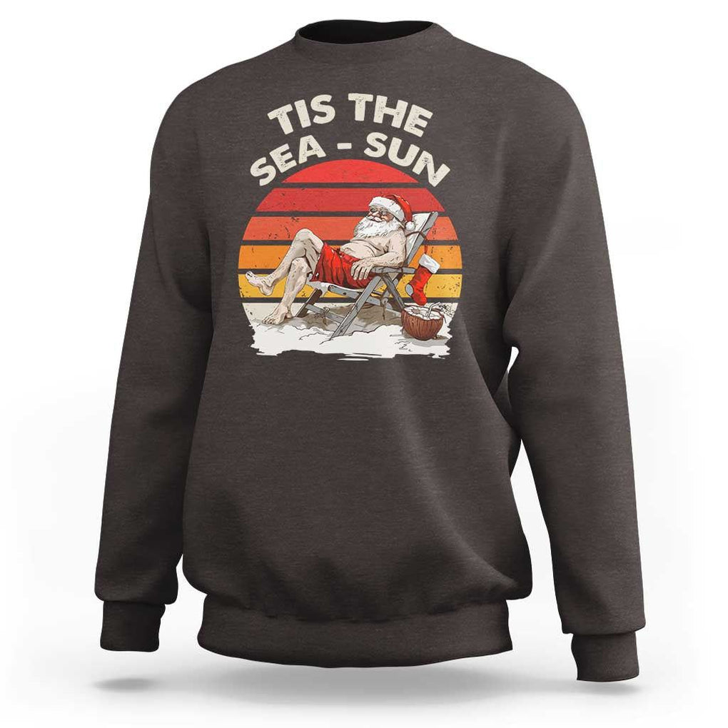 Funny Christmas In July Sweatshirt Tis The Sea Sun Santa At The Beach TS09 Dark Chocolate Print Your Wear