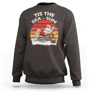 Funny Christmas In July Sweatshirt Tis The Sea Sun Santa At The Beach TS09 Dark Chocolate Print Your Wear