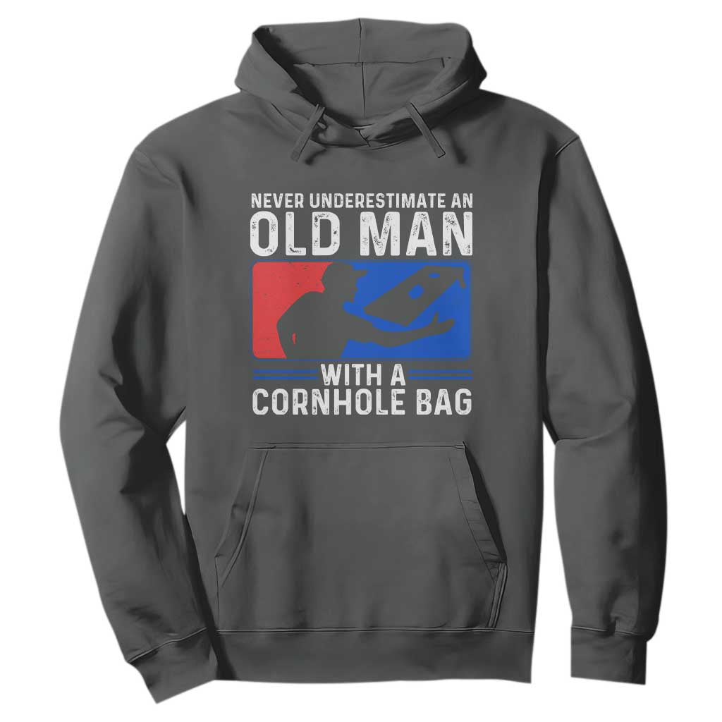 Funny Cornhole Player Hoodie Never Underestimate An Old Man With A Cornhole Bag TS10 Dark Heather Print Your Wear