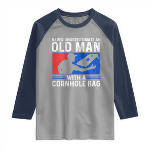 Funny Cornhole Player Raglan Shirt Never Underestimate An Old Man With A Cornhole Bag TS10 Sport Gray Navy Print Your Wear