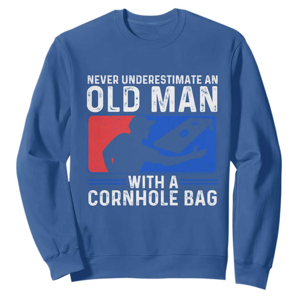 Funny Cornhole Player Sweatshirt Never Underestimate An Old Man With A Cornhole Bag TS10 Royal Blue Print Your Wear