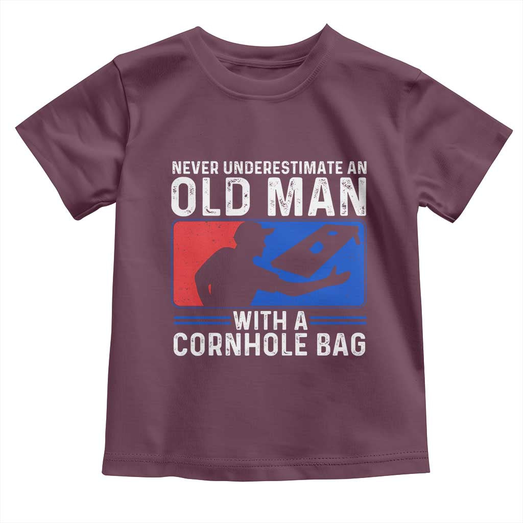 Funny Cornhole Player Toddler T Shirt Never Underestimate An Old Man With A Cornhole Bag TS10 Maroon Print Your Wear