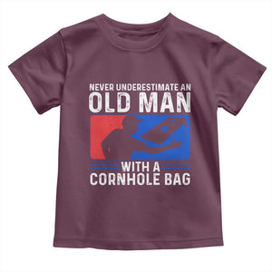 Funny Cornhole Player Toddler T Shirt Never Underestimate An Old Man With A Cornhole Bag TS10 Maroon Print Your Wear