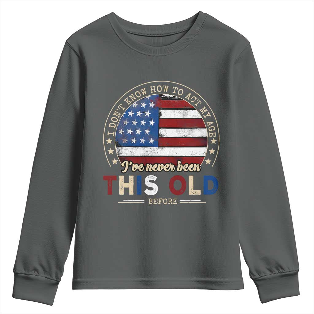 Dont Know How To Act My Age Youth Sweatshirt Vintage Funny Old Man Saying American Flag TS10 Dark Heather Print Your Wear