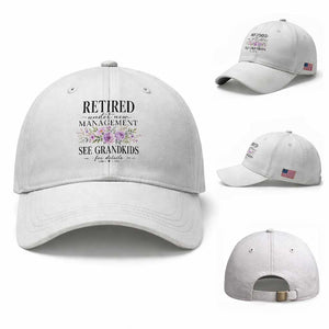 Retired Grandma Gift Baseball Cap Retired Under New Management See Grandkids For Details Retirement Flower Graphic TS10 Baseball Cap Universal Fit White Print Your Wear