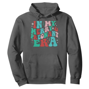 Christmas Pregnancy Announcement Hoodie Merry & Pregnant Era Cute Groovy Christmas Holiday Xmas TS10 Dark Heather Print Your Wear