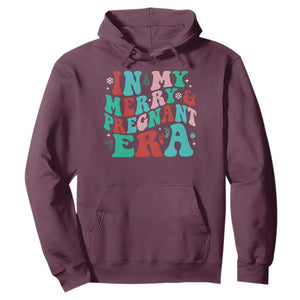 Christmas Pregnancy Announcement Hoodie Merry & Pregnant Era Cute Groovy Christmas Holiday Xmas TS10 Maroon Print Your Wear
