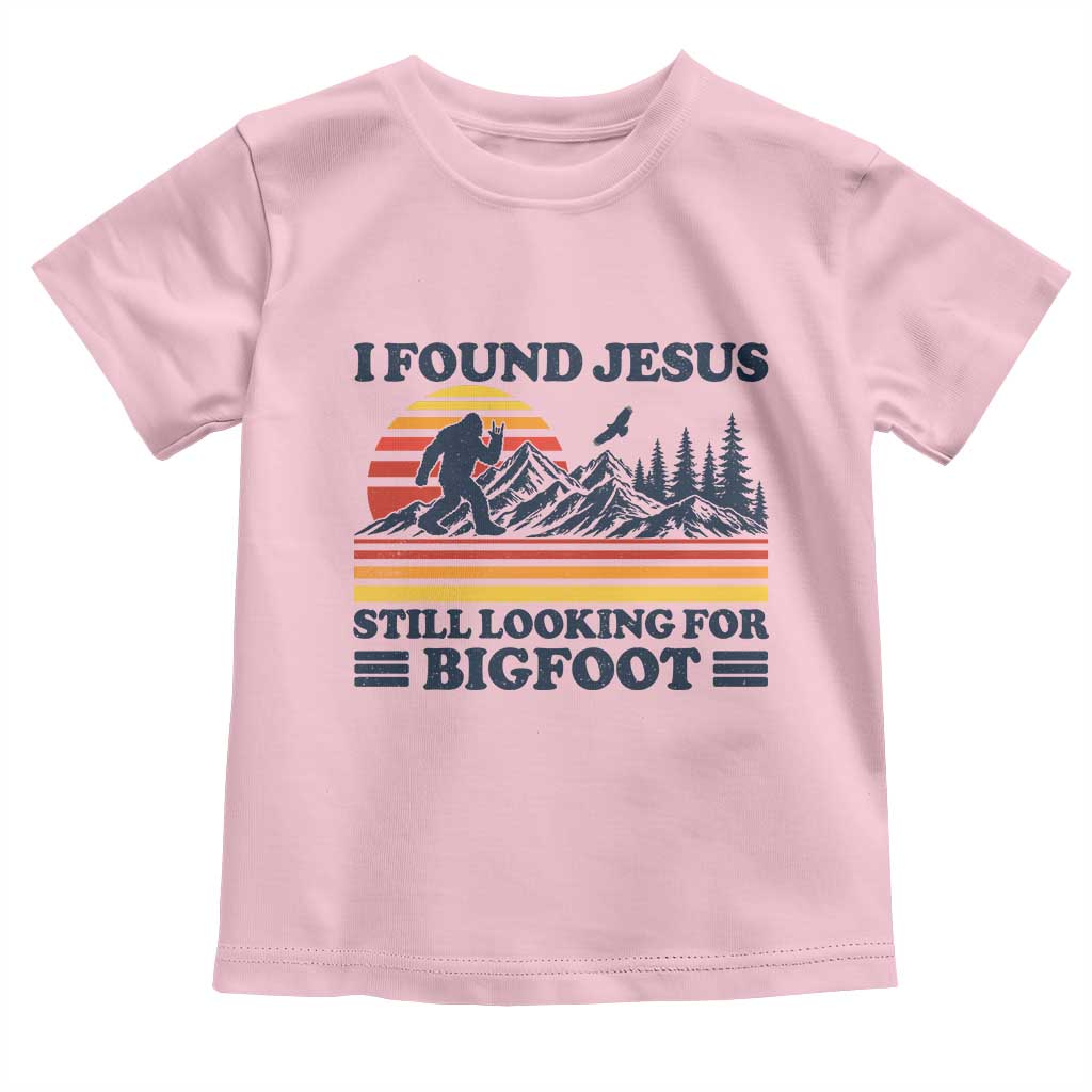 Retro I Found Jesus Still Looking For Bigfoot Toddler T Shirt Funny Sasquatch Bigfoot Believer Christian Humor TS10 Light Pink Print Your Wear