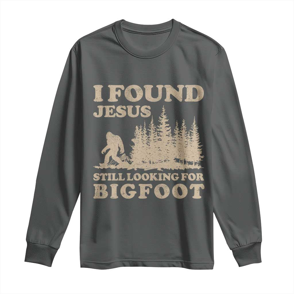 Retro I Found Jesus Still Looking For Bigfoot Long Sleeve Shirt Vintage Sasquatch Believer Funny Christian Humor TS10 Dark Heather Print Your Wear
