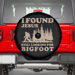 Retro I Found Jesus Still Looking For Bigfoot Spare Tire Cover Vintage Sasquatch Believer Funny Christian Humor TS10 Black Print Your Wear