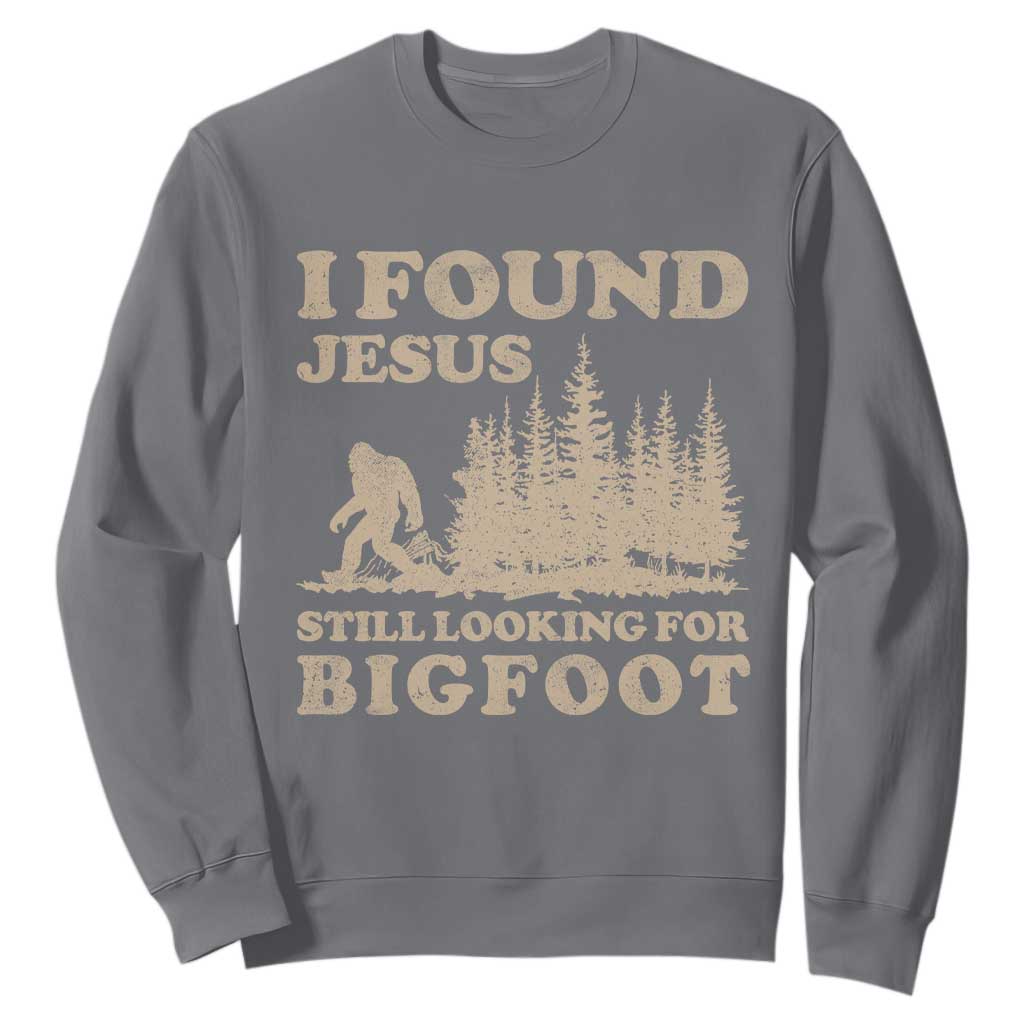 Retro I Found Jesus Still Looking For Bigfoot Sweatshirt Vintage Sasquatch Believer Funny Christian Humor TS10 Charcoal Print Your Wear