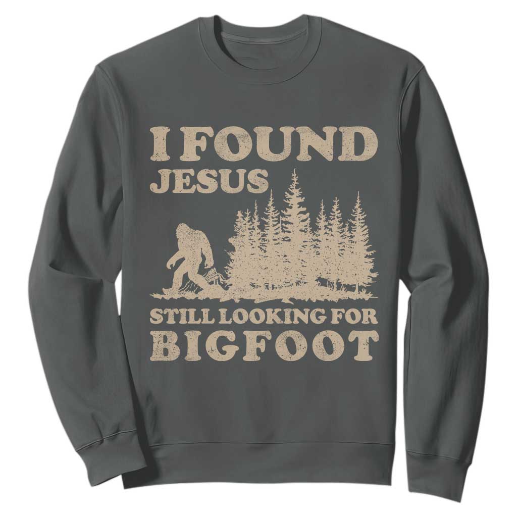 Retro I Found Jesus Still Looking For Bigfoot Sweatshirt Vintage Sasquatch Believer Funny Christian Humor TS10 Dark Heather Print Your Wear